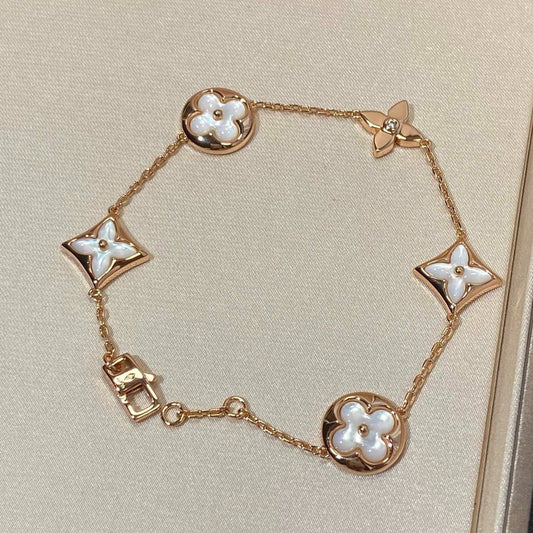 [Glow Jewelry]STAR AND SUN 5 MOTIF MOP PINK GOLD BRACELET