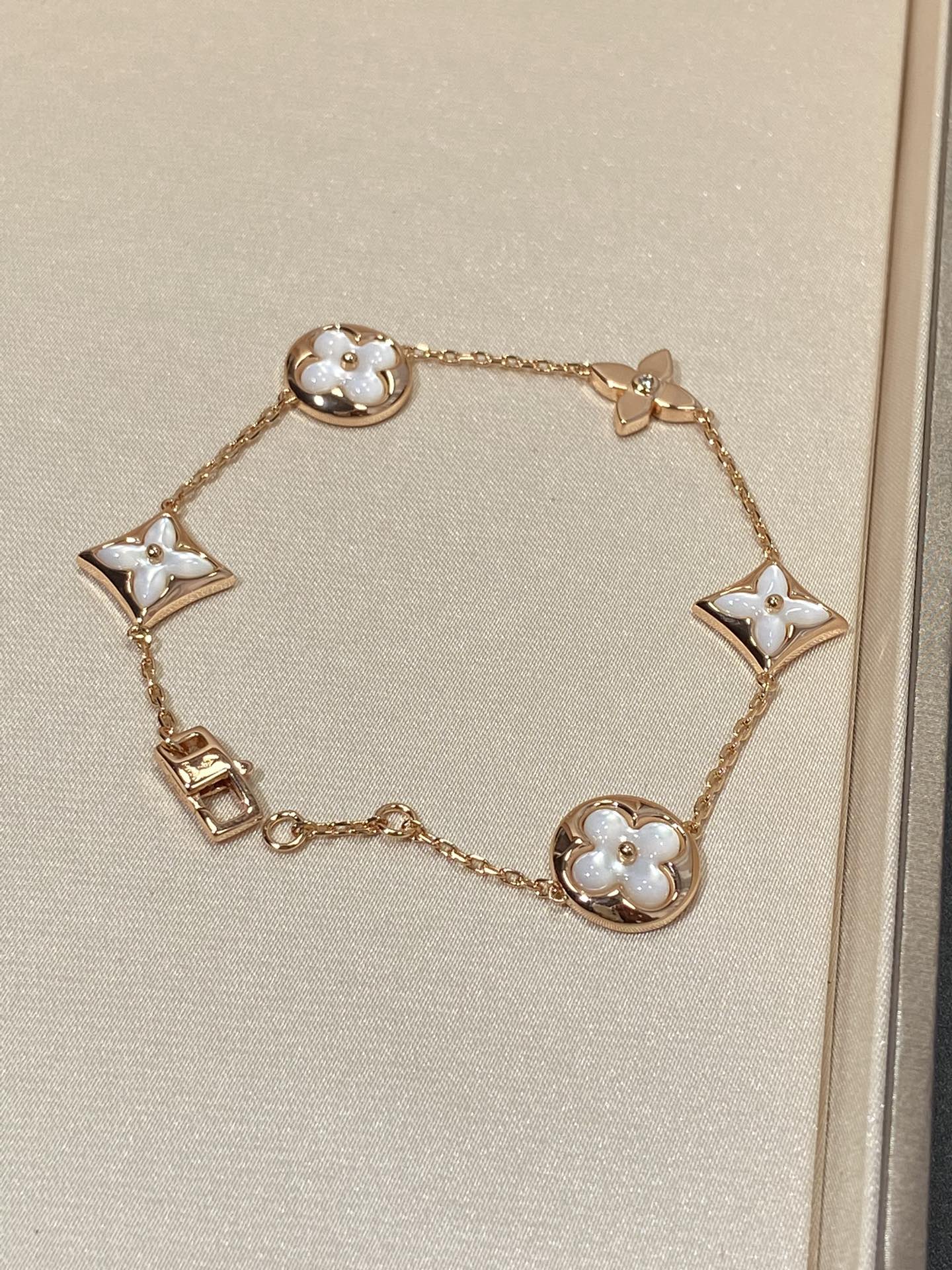 [Glow Jewelry]STAR AND SUN 5 MOTIF MOP PINK GOLD BRACELET