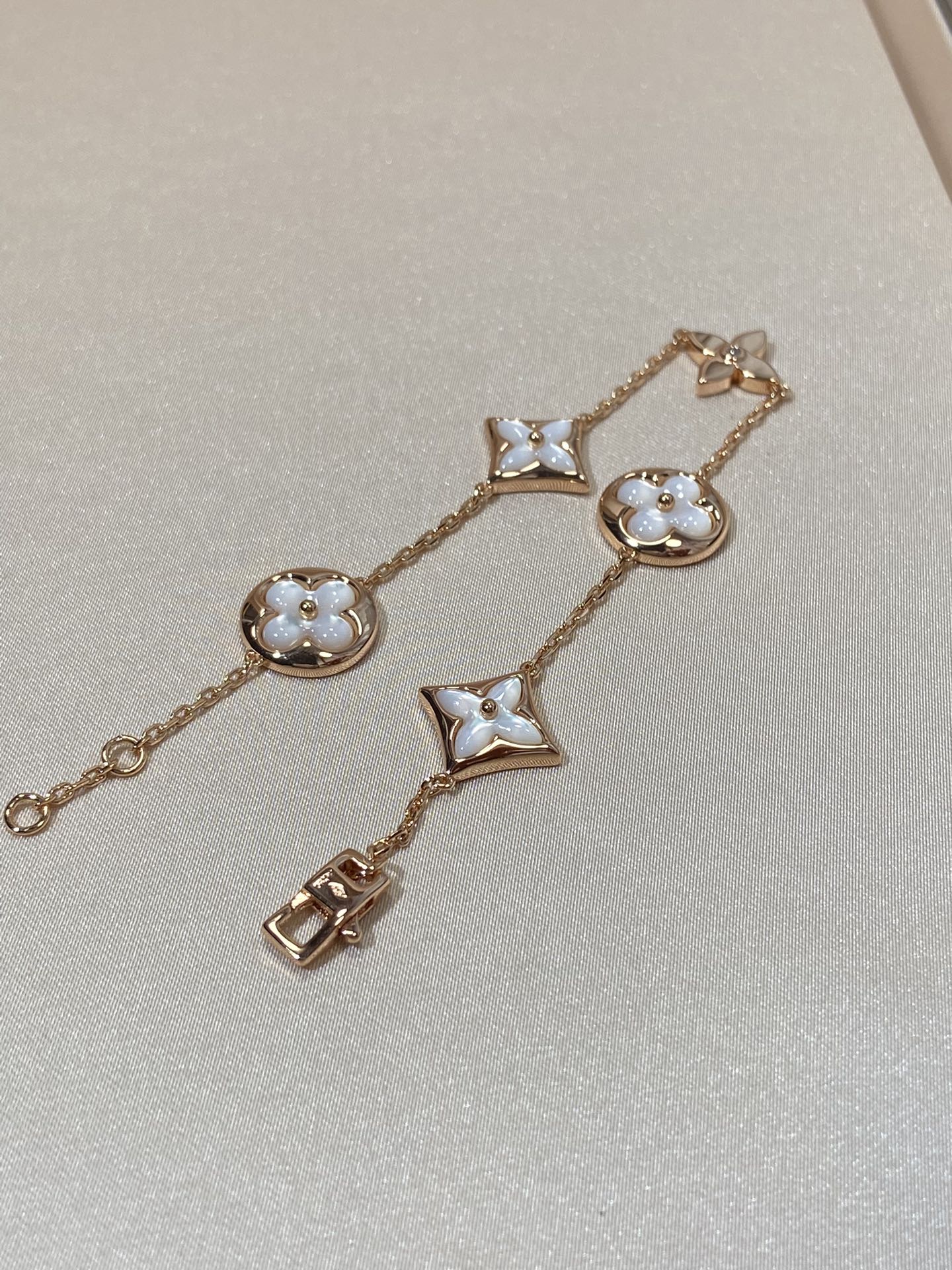[Glow Jewelry]STAR AND SUN 5 MOTIF MOP PINK GOLD BRACELET