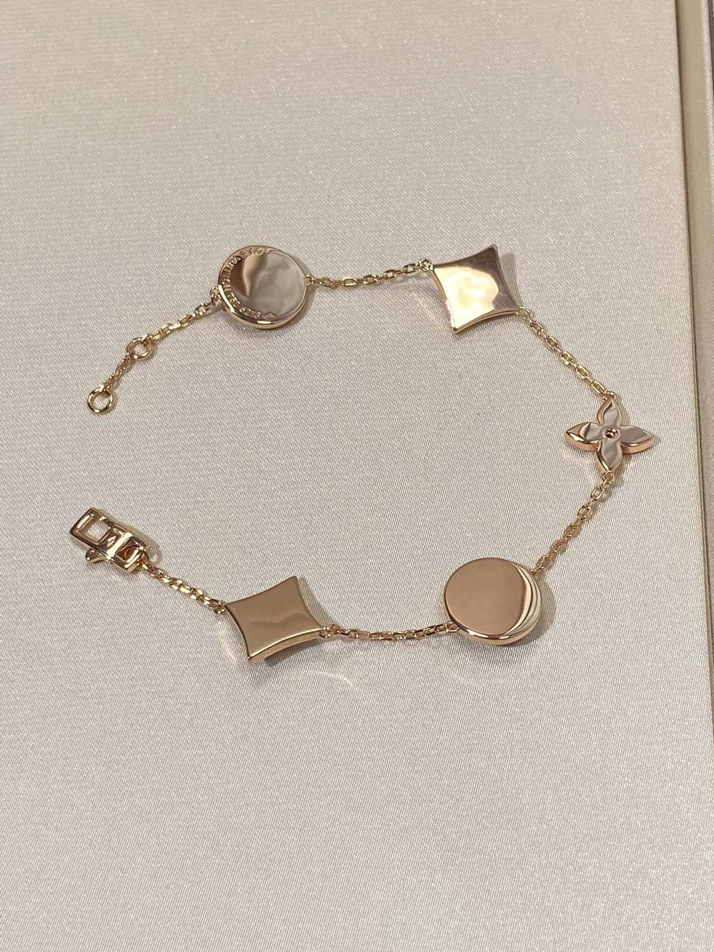 [Glow Jewelry]STAR AND SUN 5 MOTIF MOP PINK GOLD BRACELET