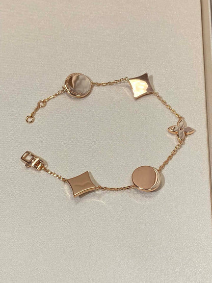[Glow Jewelry]STAR AND SUN 5 MOTIF MOP PINK GOLD BRACELET
