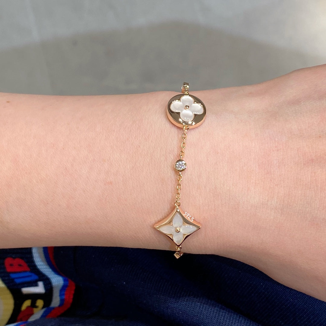 [Glow Jewelry]STAR AND SUN 4 MOTIF WHITE MOP PINK GOLD BRACELET