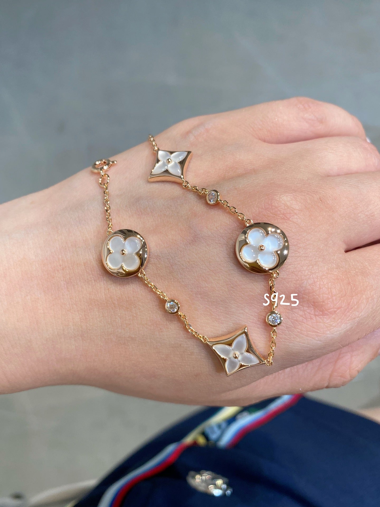 ¡®Glow Jewelry¡¯STAR AND SUN 4 MOTIF WHITE MOP PINK GOLD BRACELET
