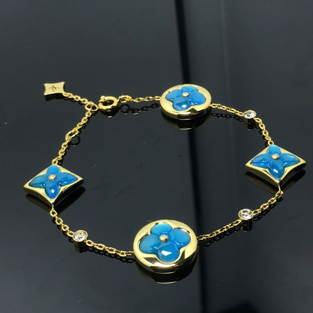 ¡®Glow Jewelry¡¯STAR AND SUN 4 MOTIF BLUE BRACELET